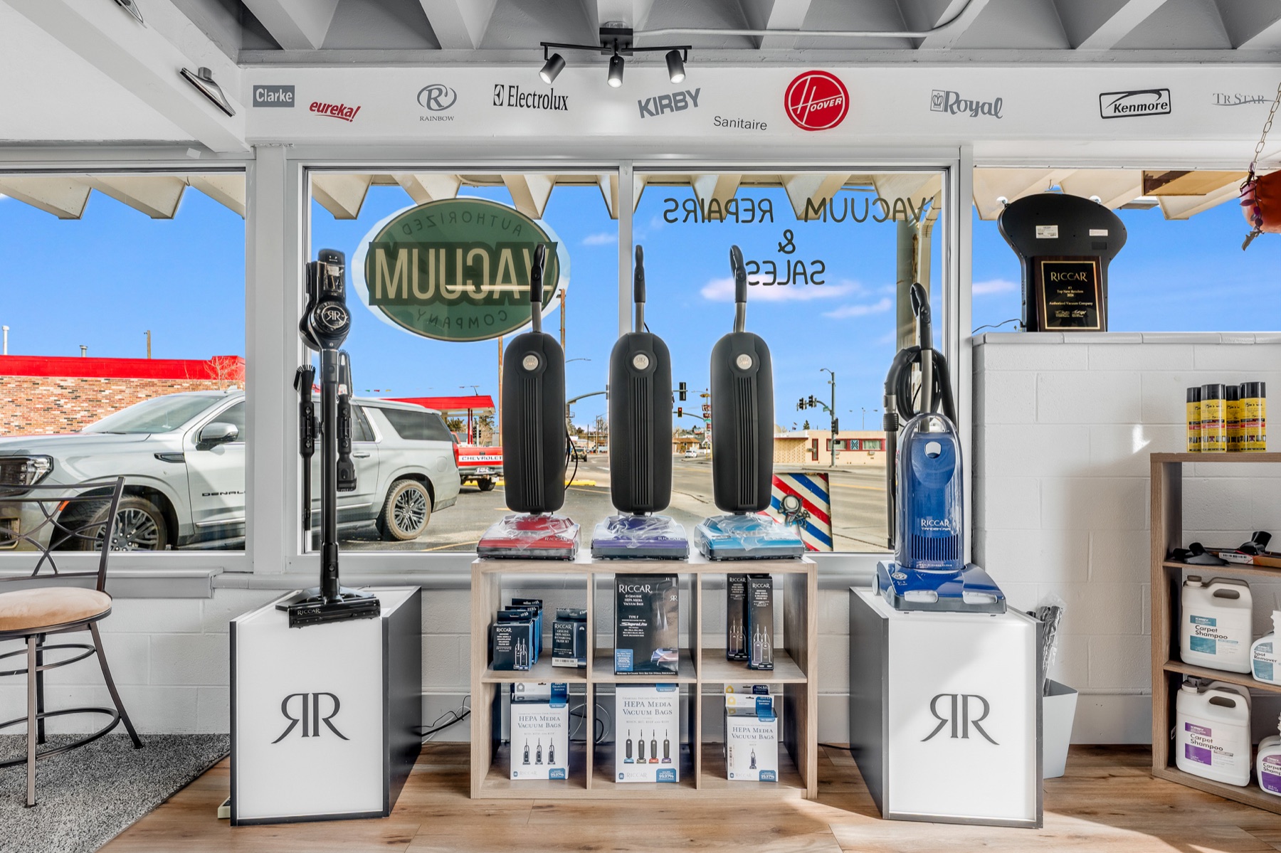 Riccar vacuums and bags in the window
